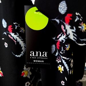 A N.A. Women's plus size sheer cover. Beautiful floral pattern. New with tags.